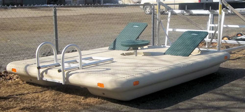  Otter Island Swim Rafts ( 8’ x 10’). Comes complete with fold up backrests, pop up table and fold down ladder. Available in Yellow w/ blue or Tan w/ green. Photo - Schoodic Enterprises sell and service Maine Made Aqua-Lounge Dock  Alum. Docks, Boat Lifts, Watercraft Lifts & More - SchoodicEnterprises.com